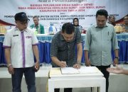 Teken NPHD, Pj. Bupati Buton Ingatkan Netralitas ASN